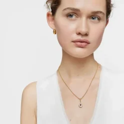 Colgante medalla con baño de oro de 18 kt sobre plata, nácar y amatista Medallions^TOUS Discount