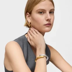 Pulsera esclava bicolor ancha con motivos oso y corazón 1950^TOUS